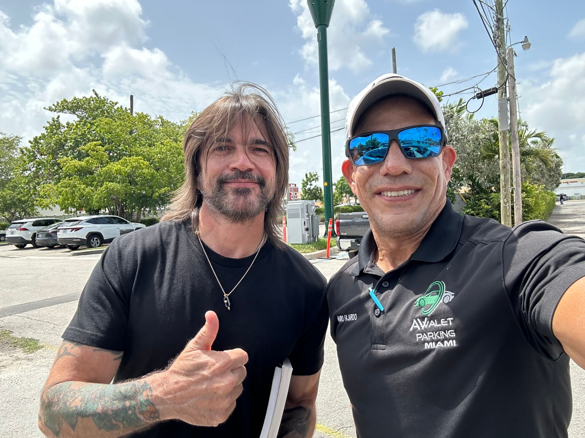 AV Valet owner Mauro Fajardo with recording artist Juanes